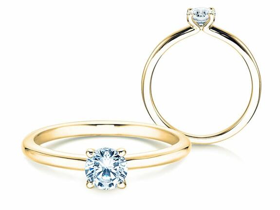 Bagues de fiançailles en or jaune avec diamant. Classique romantique en or