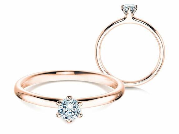 Bagues de fiançailles en or rose avec diamant. La tendance de l'année